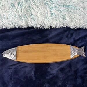 Silver and Brown Fish-Shaped Platter
 impressive when serving Bagels and Lox